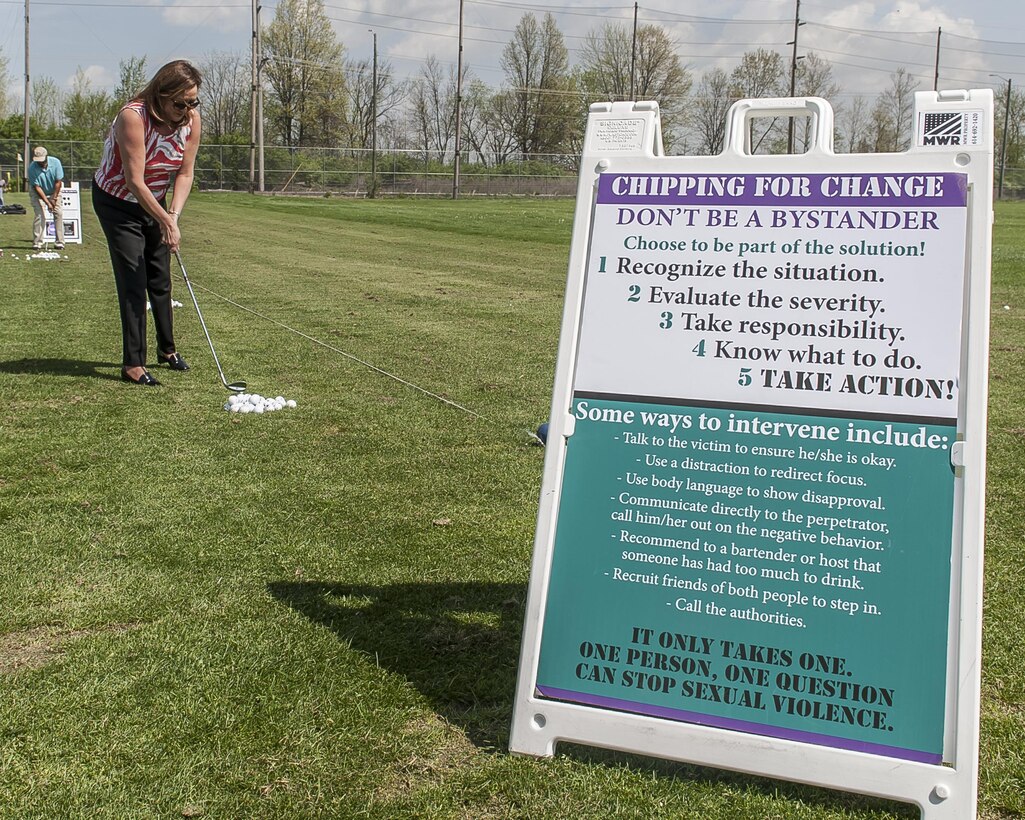 DLA Deputy Director of Acquisition (J7) Roxanne Banks takes part in DLA Land and Maritime's "Climate of Respect - Par Fore the Course" event April 20 at Defense Supply Center Columbus. The event was part of the Agency's month-long Sexual Assault Awareness and Prevention campaign.