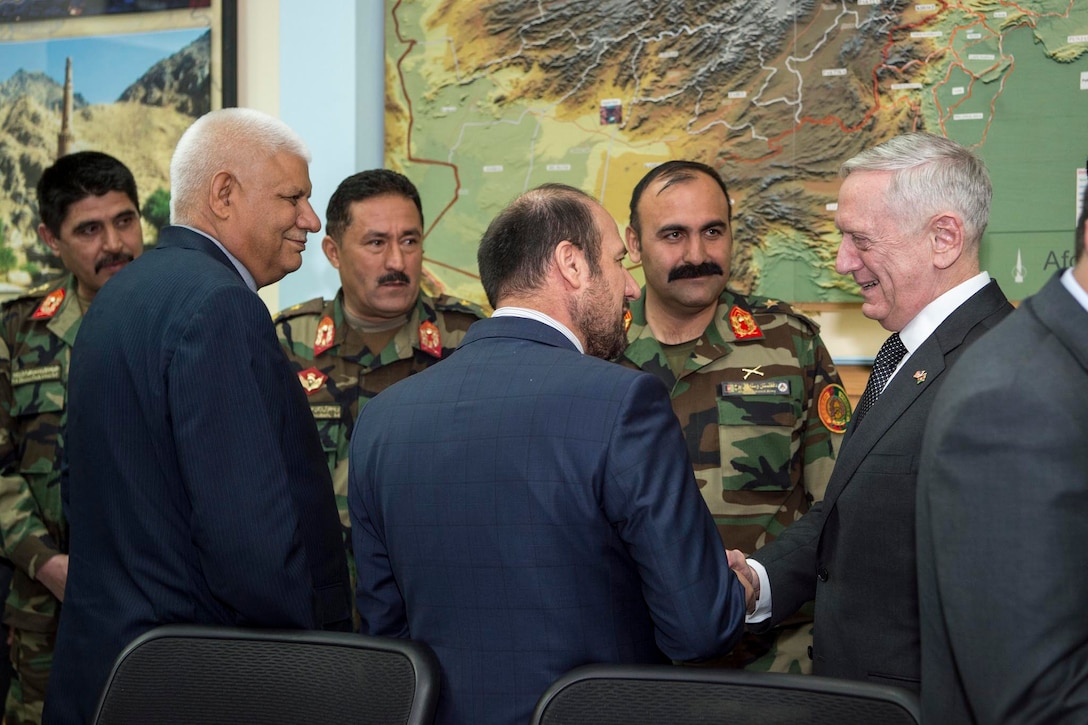 Defense Secretary Jim Mattis speaks with Afghan Minister of Interior Affairs Mohammad Jahid and Afghan Minister of Defense Abdullah Habibi