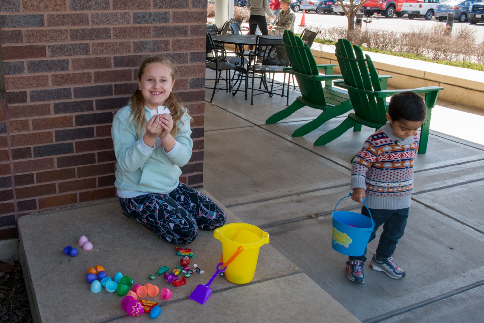 During the Key Supporters 2nd annual Easter egg hunt Jadyn Thaemert, daughter of Tech. Sgt. Greg Thaemert, 934th Aerial Port Squadron, shows off her three extra prize tickets found in eggs April 1 at Minneapolis-St. Paul Air Reserve Station, Minn. (U.S. Air Force photo by Senior Airman Samuel Wacha)