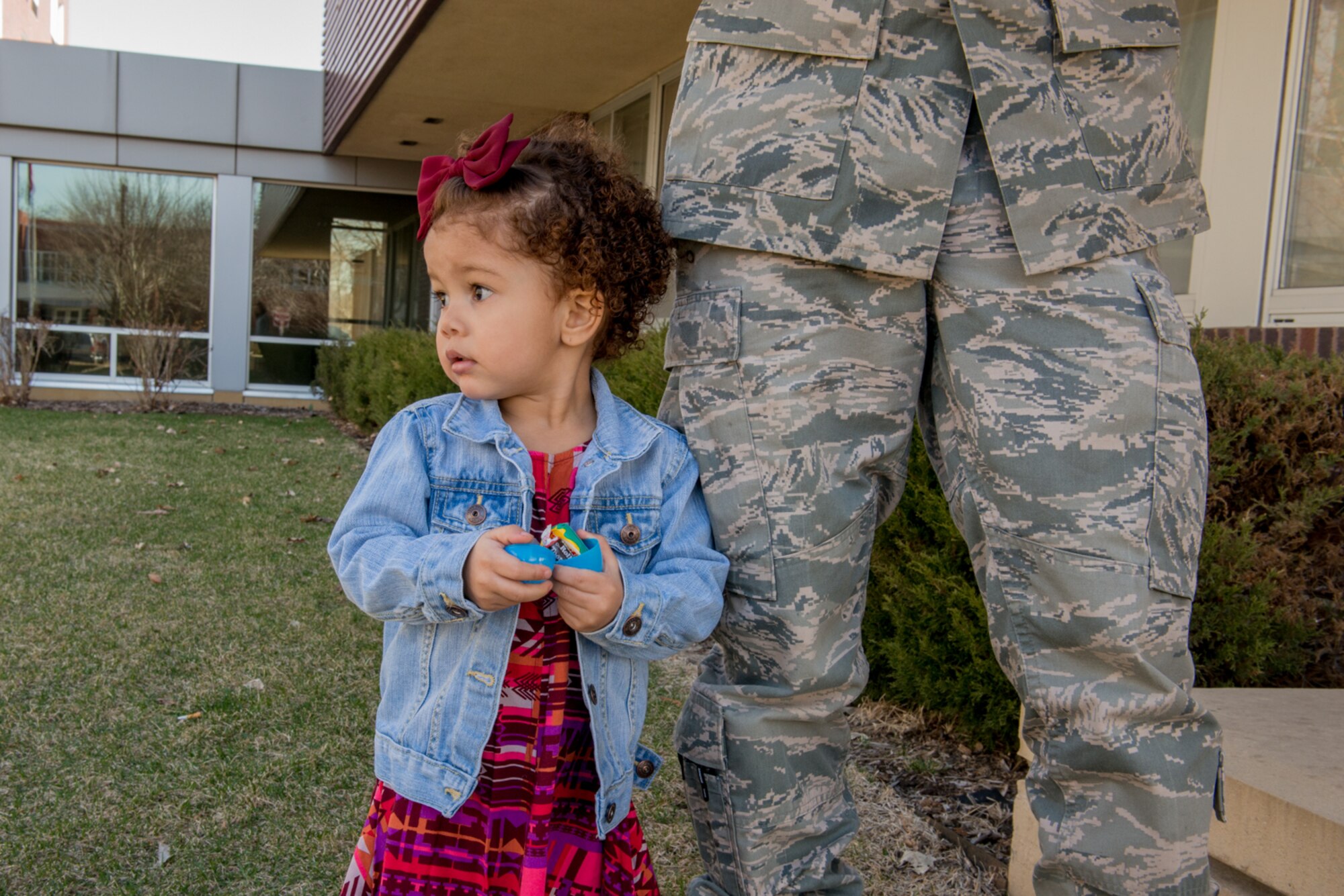 Durring the Key Supporters 2nd annual Easter egg hunt Violet Ruter, daughter of Staff Sgt. Chris Ruter, 934th Communications Squadron, opens her egg filled with candy April 1 at Minneapolis-St. Paul Air Reserve Station, Minn. (U.S. Air Force photo by Senior Airman Samuel Wacha)