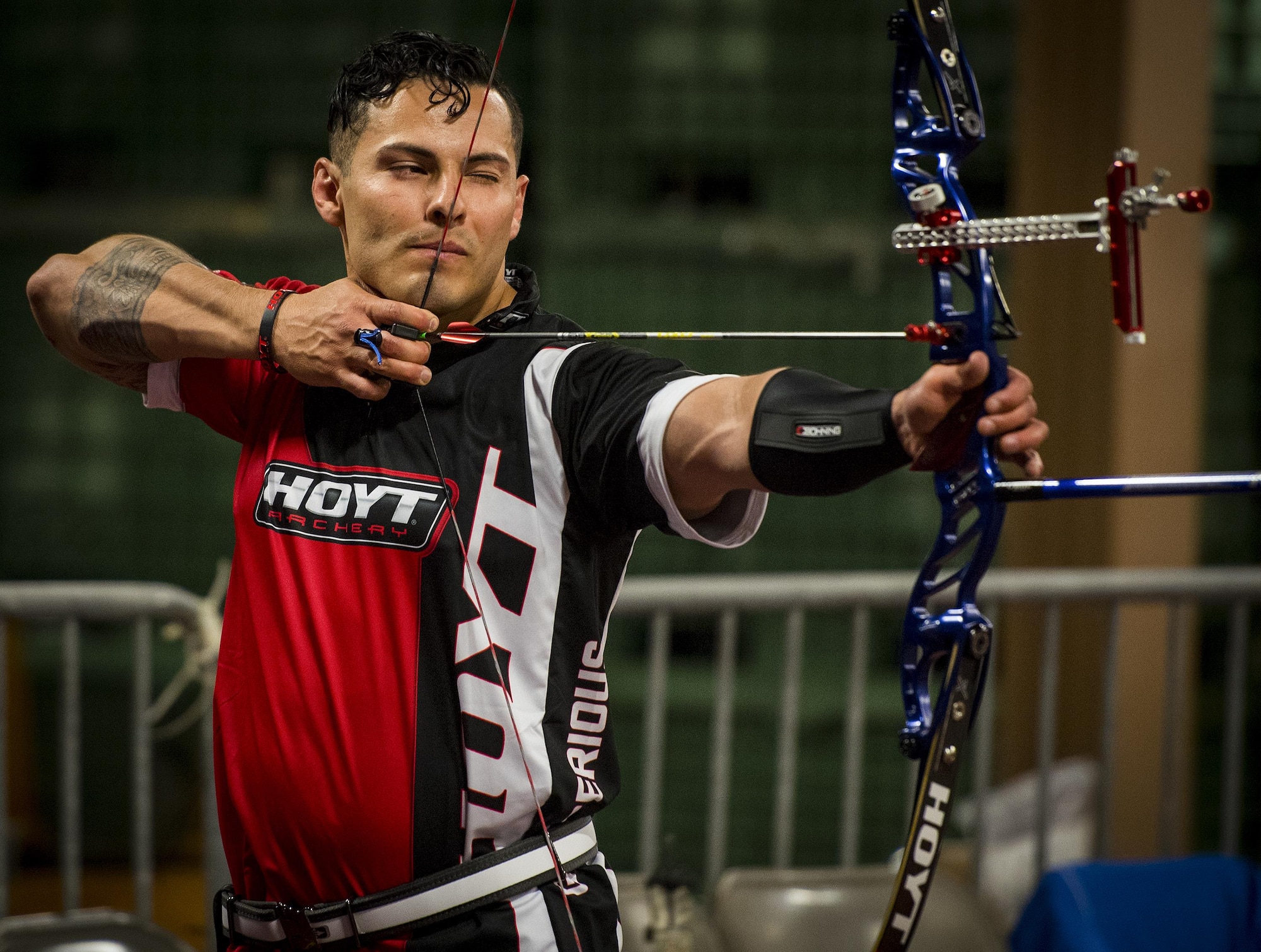 Staff Sgt. Vince Cavazos, a Warrior Games athlete, aims for a bullseye during an archery session at the Air Force team’s training camp at Eglin Air Force Base, Fla., April 24. The base-hosted, week-long Warrior Games training camp is the last team practice session before the yearly competition in June. (U.S. Air Force photo/Samuel King Jr.)