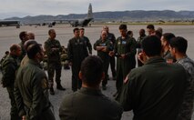U.S. Air Force Capt. Christopher Freed, 37th Airlift Squadron pilot, briefs the Hellenic air force and U.S. Army about the jump they will undergo during Exercise Stolen Cerberus IV at Elefsis Air Base, Greece, April 21, 2017. During the exercise, the U.S. Air Force and Army have worked alongside the Hellenic air force to perform cargo, static-line personnel, and military free-fall personnel air drops. Through exercises such as this the U.S. strengthens its partnership with its NATO allies. (U.S Air Force photo by Senior Airman Tryphena Mayhugh)