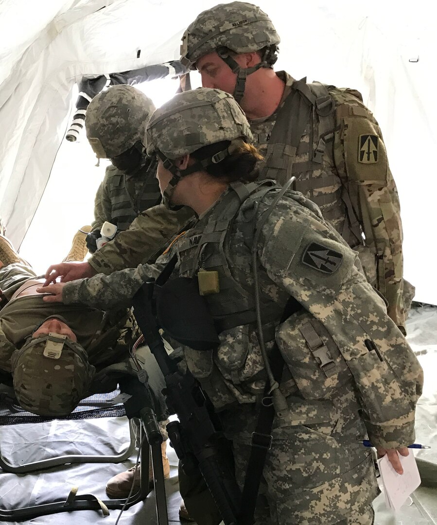 Charlie Med, C Company, 113th Brigade Sustainment Battalion, 76th Infantry Brigade Combat Team Soldiers maintain their skills by training how to administer an EKG during the Spring Field Training Exercise in preparation for Joint Readiness Training Center rotation, #JRTC, later this summer.