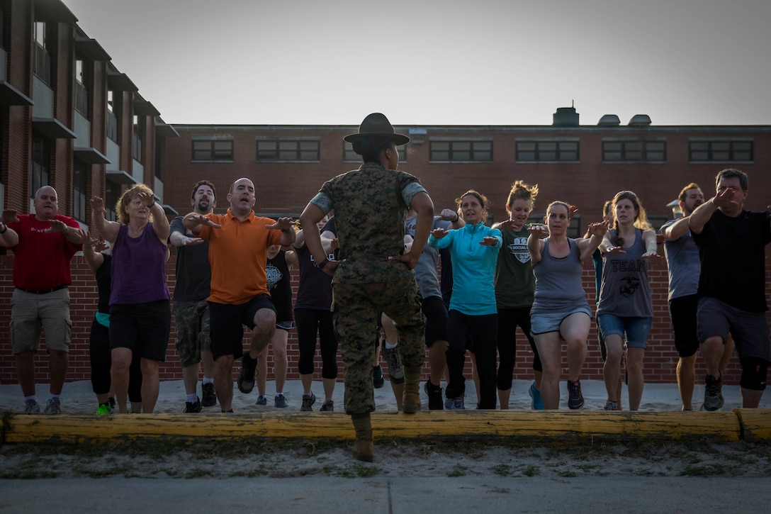 U.S. Marine Corps Staff Sgt. Simone King introduces high school and college educators from Maine, New Hampshire, Vermont and Massachusetts to an incentive training sand pit during the Educators’ Workshop on Marine Corps Recruit Depot Parris Island, S.C., April 19, 2017. The workshop is a four-day program designed to better inform high school and college educators about the benefits and opportunities available during service in the Marine Corps. This allows the attendees to return to their place of business and provide firsthand experience and knowledge with individuals interested in military service. King is a drill instructor with the Recruit Training Regiment, MCRD Parris Island. (Official Marine Corps photo by Staff Sgt. Jonathan G. Wright / Released)