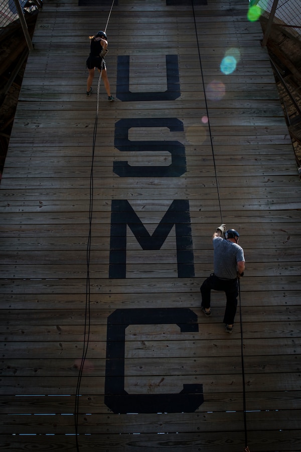 High school and college educators from Maine, New Hampshire, Vermont and Massachusetts descend the rappel tower during the Educators’ Workshop on Marine Corps Recruit Depot Parris Island, S.C., April 20, 2017. The workshop is a four-day program designed to better inform high school and college educators about the benefits and opportunities available during service in the Marine Corps. This allows the attendees to return to their place of business and provide firsthand experience and knowledge with individuals interested in military service. (Official Marine Corps photo by Staff Sgt. Jonathan G. Wright / Released)