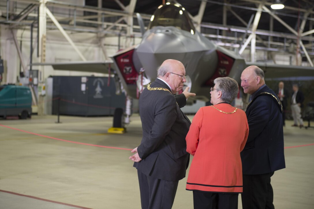 Councillor David Whitby, Mayor of Kings Lynn and West Norfolk, left, Linda Whitby, Mayoress of Kings Lynn and West Norfolk, center, and Councillor Paul Darby, Mayor of Swaffham, right, talk in front of an F-35A Lightning II from the 34th Fighter Squadron at Hill Air Force Base, Utah, during a civic leader tour at Royal Air Force Lakenheath, England, April 24, 2017. The fifth generation, multi-role fighter aircraft is deployed here to maximize training opportunities, affirm enduring commitments to NATO allies, and deter any actions that destabilize regional security. (U.S. Air Force photo/Senior Airman Malcolm Mayfield)