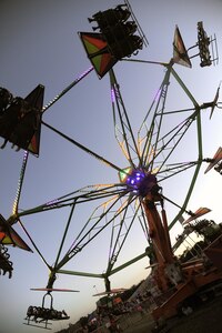 Fiesta and Fireworks fairgoers catch some air on the rides at Joint Base San Antonio-Fort Sam Houston April 23.