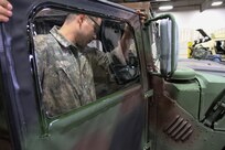 U.S. Army Reserve Spc. Javier Meza, mechanic, replaces a door on a Humvee during Operation Cold Steel at Fort McCoy, Wis., April 13, 2017. Operation Cold Steel is the U.S. Army Reserve's crew-served weapons qualification and validation exercise to ensure that America's Army Reserve units and Soldiers are trained and ready to deploy on short-notice and bring combat-ready and lethal firepower in support of the Army and our joint partners anywhere in the world. (U.S. Army Reserve photo by Staff Sgt. Debralee Best, 84th Training Command)
