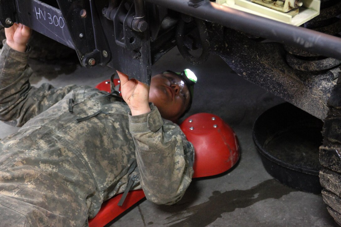 U.S. Army Reserve Spc. Robert Camanini, mechanic, checks the underside of a Humvee for leaks during Operation Cold Steel at Fort McCoy, Wis., April 13, 2017. Operation Cold Steel is the U.S. Army Reserve's crew-served weapons qualification and validation exercise to ensure that America's Army Reserve units and Soldiers are trained and ready to deploy on short-notice and bring combat-ready and lethal firepower in support of the Army and our joint partners anywhere in the world. (U.S. Army Reserve photo by Staff Sgt. Debralee Best, 84th Training Command)