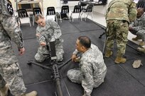 U.S. Army Reserve Staff Sgt. Cassie Arredondo, 490th Civil Affairs Battalion, U.S. Army Civil Affair and Psychological Operations Command, pulls the charging handle of an M2 .50 caliber machine gun while completing primary marksmanship instruction during Operation Cold Steel at Fort McCoy, Wis., April 20, 2017. Operation Cold Steel is the U.S. Army Reserve's crew-served weapons qualification and validation exercise to ensure that America's Army Reserve units and Soldiers are trained and ready to deploy on short-notice and bring combat-ready and lethal firepower in support of the Army and our joint partners anywhere in the world. (U.S. Army Reserve photo by Staff Sgt. Debralee Best, 84th Training Command)