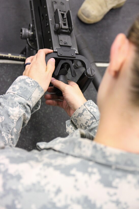 U.S. Army Reserve Staff Sgt. Cassie Arredondo, 490th Civil Affairs Battalion, U.S. Army Civil Affair and Psychological Operations Command, completes primary marksmanship instruction on an M2 .50 caliber machine gun during Operation Cold Steel at Fort McCoy, Wis., April 20, 2017. Operation Cold Steel is the U.S. Army Reserve's crew-served weapons qualification and validation exercise to ensure that America's Army Reserve units and Soldiers are trained and ready to deploy on short-notice and bring combat-ready and lethal firepower in support of the Army and our joint partners anywhere in the world. (U.S. Army Reserve photo by Staff Sgt. Debralee Best, 84th Training Command)