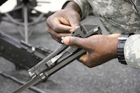 A U.S. Army Reserve Soldier with 490th Civil Affairs Battalion, U.S. Army Civil Affair and Psychological Operations Command, assembles an M240B machine gun while completing primary marksmanship instruction during Operation Cold Steel at Fort McCoy, Wis., April 20, 2017. Operation Cold Steel is the U.S. Army Reserve's crew-served weapons qualification and validation exercise to ensure that America's Army Reserve units and Soldiers are trained and ready to deploy on short-notice and bring combat-ready and lethal firepower in support of the Army and our joint partners anywhere in the world. (U.S. Army Reserve photo by Staff Sgt. Debralee Best, 84th Training Command)