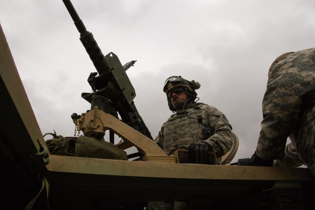 U.S. Army Reserve Spc. Zachary Rumo, 366th Engineer Company, 412th Theater Engineer Command, steadies an M2 .50 caliber machine gun after completing basic live fire during Operation Cold Steel at Fort McCoy, Wis., April 20, 2017. Operation Cold Steel is the U.S. Army Reserve's crew-served weapons qualification and validation exercise to ensure that America's Army Reserve units and Soldiers are trained and ready to deploy on short-notice and bring combat-ready and lethal firepower in support of the Army and our joint partners anywhere in the world. (U.S. Army Reserve photo by Staff Sgt. Debralee Best, 84th Training Command)