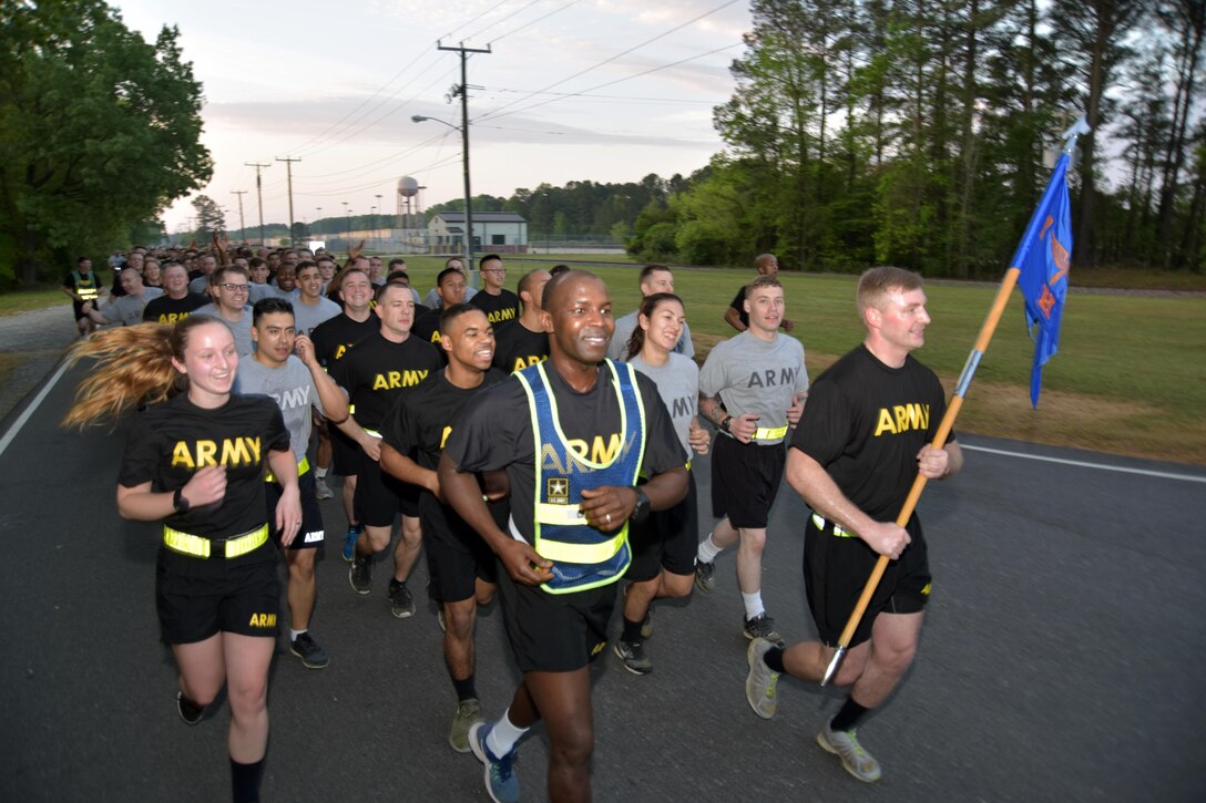 Capt. Kekura Maran, assigned to the 1-222d Aviation Regiment, leads his company during the Army Reserve's 109th Birthday Celebration run on Joint Base-Langley, Virginia 21 April 2017.