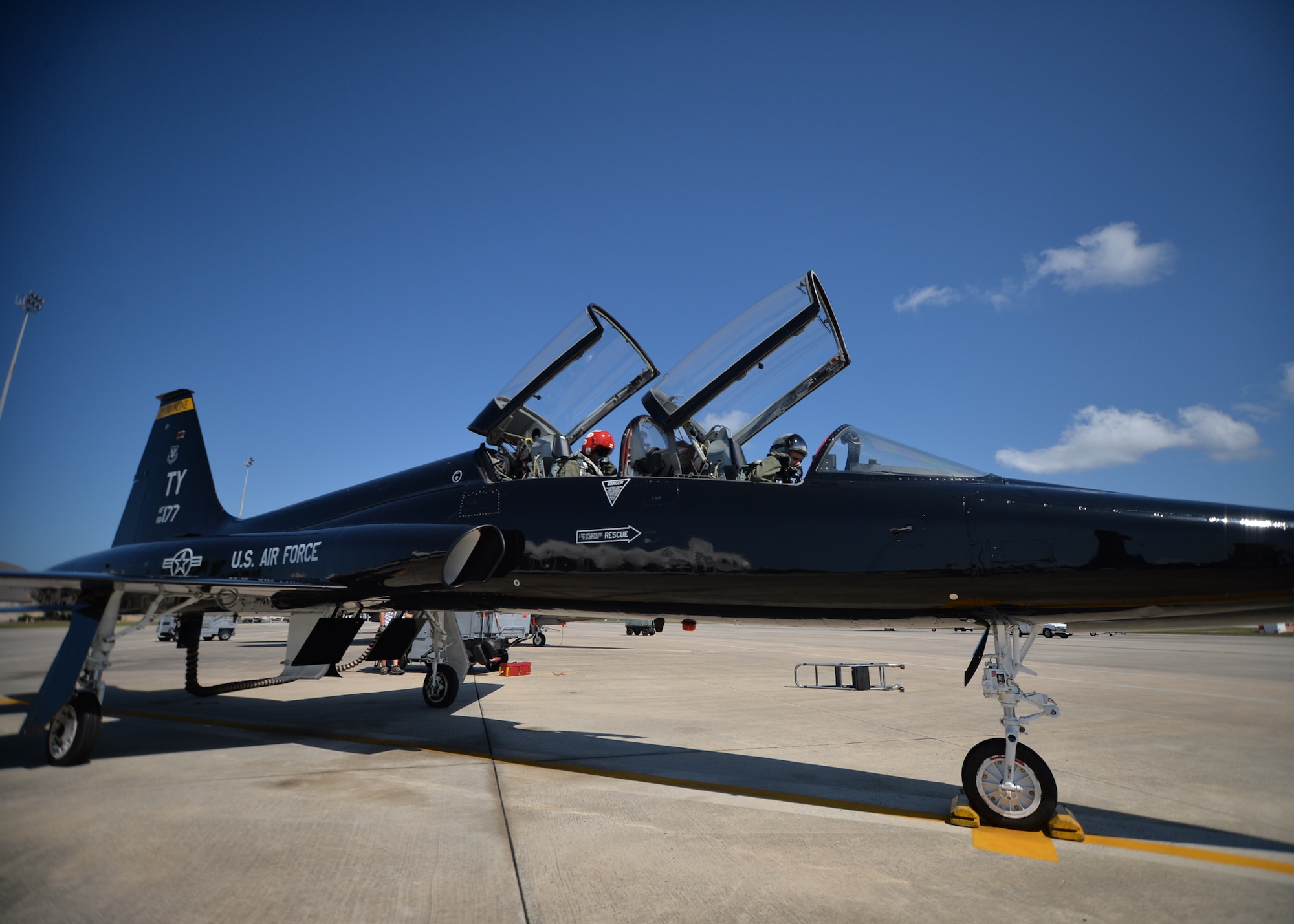 Retired U.S. Air Force Lt. Col. Dale Cooke, former U.S. Air Force Thunderbirds pilot (back seat), and Lt. Col. Richard McCurdy, 2nd Fighter Training Squadron commander (front seat), complete a pre-flight checklist before taxing for take-off at Tyndall Air Force Base, Fla., April 21, 2017. Cooke and McCurdy would complete a historical flight with two current Thunderbirds over the Gulf of Mexico. Cooke last flew Slot Machine (aircraft #177) 35 years ago, it is the last original unmodified T-38A Thunderbird. (U.S. Air Force Photo by Tech. Sgt. Javier Cruz/ Released)