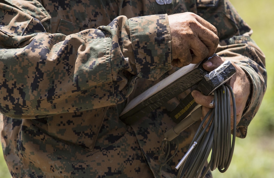 MARINE CORPS BASE HAWAII – An explosive ordnance technician with Headquarters Battalion equips C4 explosives and time fuses in preparation for detonating unexploded ordnance at Kaneohe Bay Range Training Facility aboard MCB Hawaii, on March 2, 2017. The purpose of this sweep is to clear the range of any unexploded ordnance allowing range personnel and units conducting training, the ability to work in a safer environment. (U.S. Marine Corps Photo by Lance Cpl. Isabelo Tabanguil)