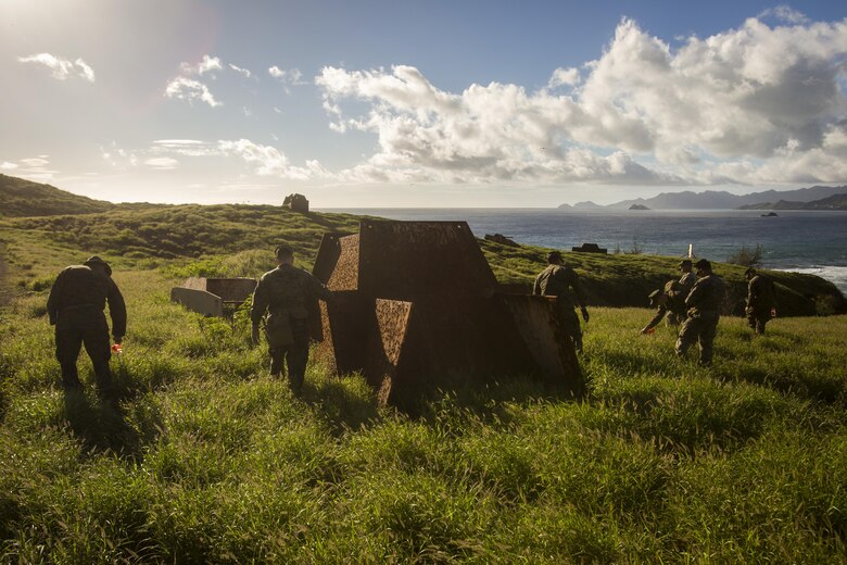 MARINE CORPS BASE HAWAII – Marines with Explosive Ordnance Disposal of Headquarters Battalion and Combat Logistics Battalion 3 conduct a range sweep at Kaneohe Bay Range Training Facility aboard MCB Hawaii on March 2, 2017. The purpose of this sweep is to clear the range of any unexploded ordnance allowing range personnel and units conducting training, the ability to work in a safer environment. (U.S. Marine Corps Photo by Lance Cpl. Isabelo Tabanguil)