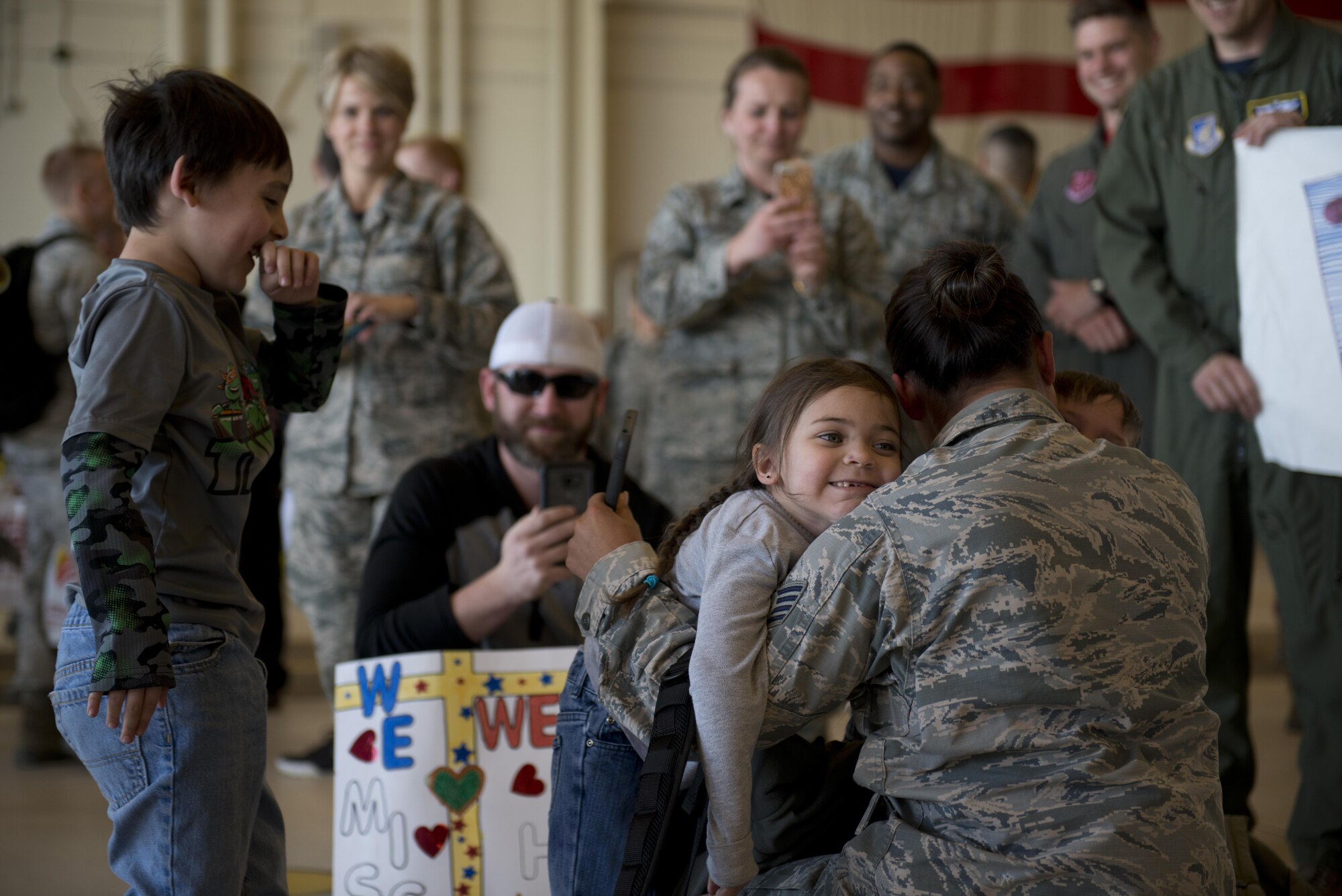 Friends and Families reunite at Hangar 25 on Joint Base Elmendorf-Richardson, Alaska April 21 as the 525th Fighter Squadron to return from a 7-month deployment. For many families, this was their first time being separated from their loved ones for an extended period of time. 