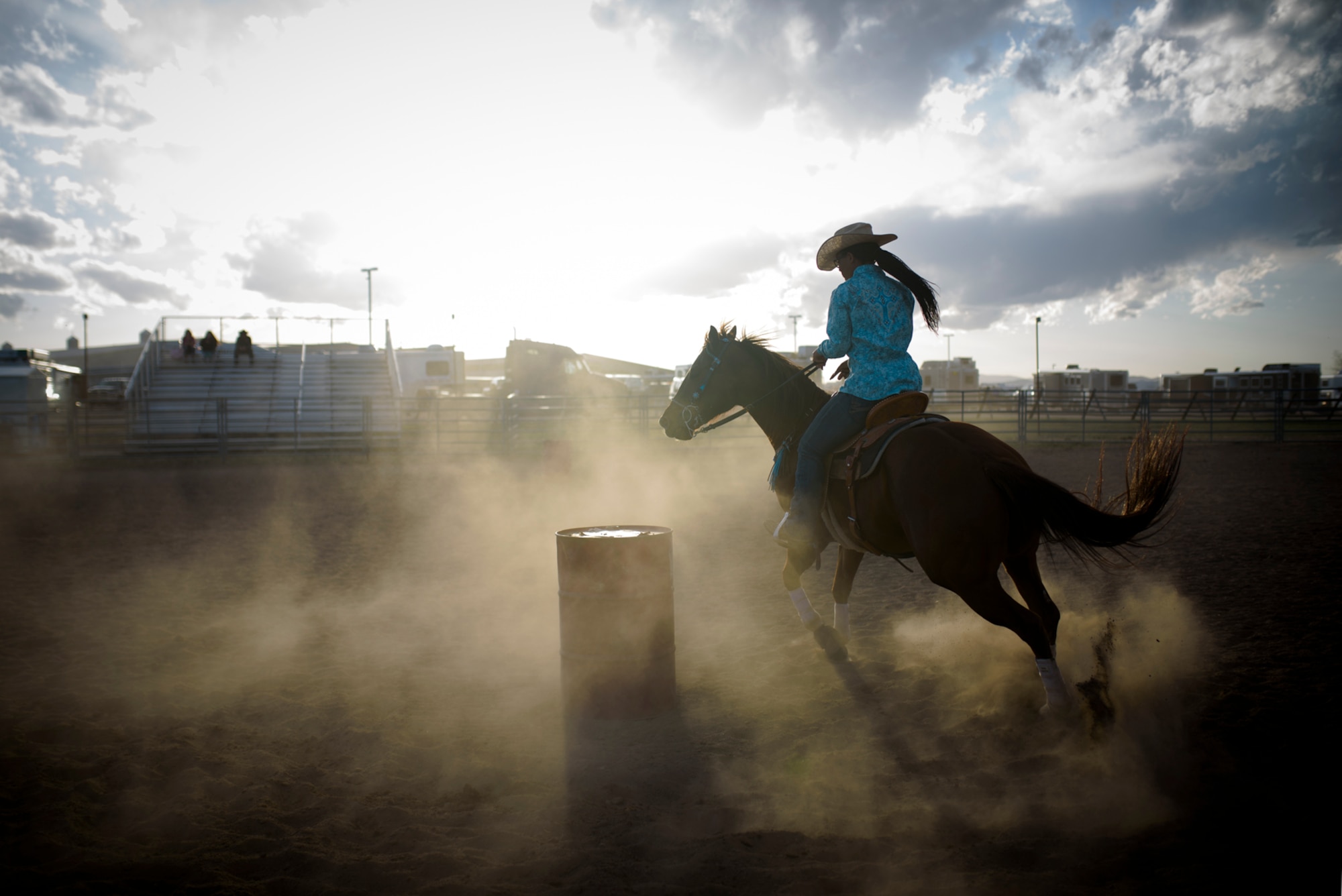 Aleeyah, daughter of Lt. Col. Nicole Roberts, 21st Security Forces Squadron commander, practices with her horse, Reekay, at a barrel racing event in Loveland, Colo., April 15, 2017. Aleeyah competes in Colorado Pro Rodeo Association events. (U.S. Air Force photo by Airman 1st Class Dennis Hoffman)