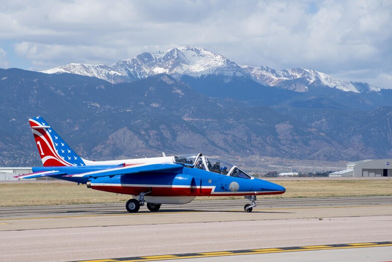 PETERSON AIR FORCE BASE, Colo. – French pilots with the Patrouille de France arrive at Peterson Air Force Base, Colo., after a flyover demonstration for the U.S. Air Force Academy, April 19, 2017. The aerobatic demonstration team is on a seven-week tour of the U.S. to commemorate the 100th anniversary of the U.S. entering into World War One. (U.S. Air Force photo by Airman 1st Class Dennis Hoffman)