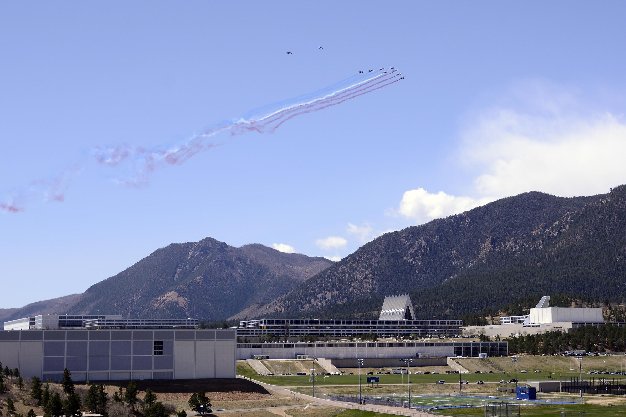 U.S. AIR FORCE ACADEMY, Colo. – French pilots with the Patrouille de France fly over the Colorado Springs, Colorado, area during a flyover for the U.S. Air Force Academy, April 19, 2017. The aerobatic demonstration team is on a seven-week tour of the U.S. to commemorate the 100th anniversary of the U.S. entering into World War One. (U.S. Air Force photo by Michael Kaplan)