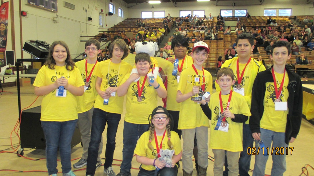 Team Legotronics from Harris Middle School in Shelbyville receive a first place LEGO® trophy at the East Tennessee FIRST® LEGO® League Championships held at Tennessee Tech University in February. The students placed for their presentation of their Animal Allies project. (Photo submitted)