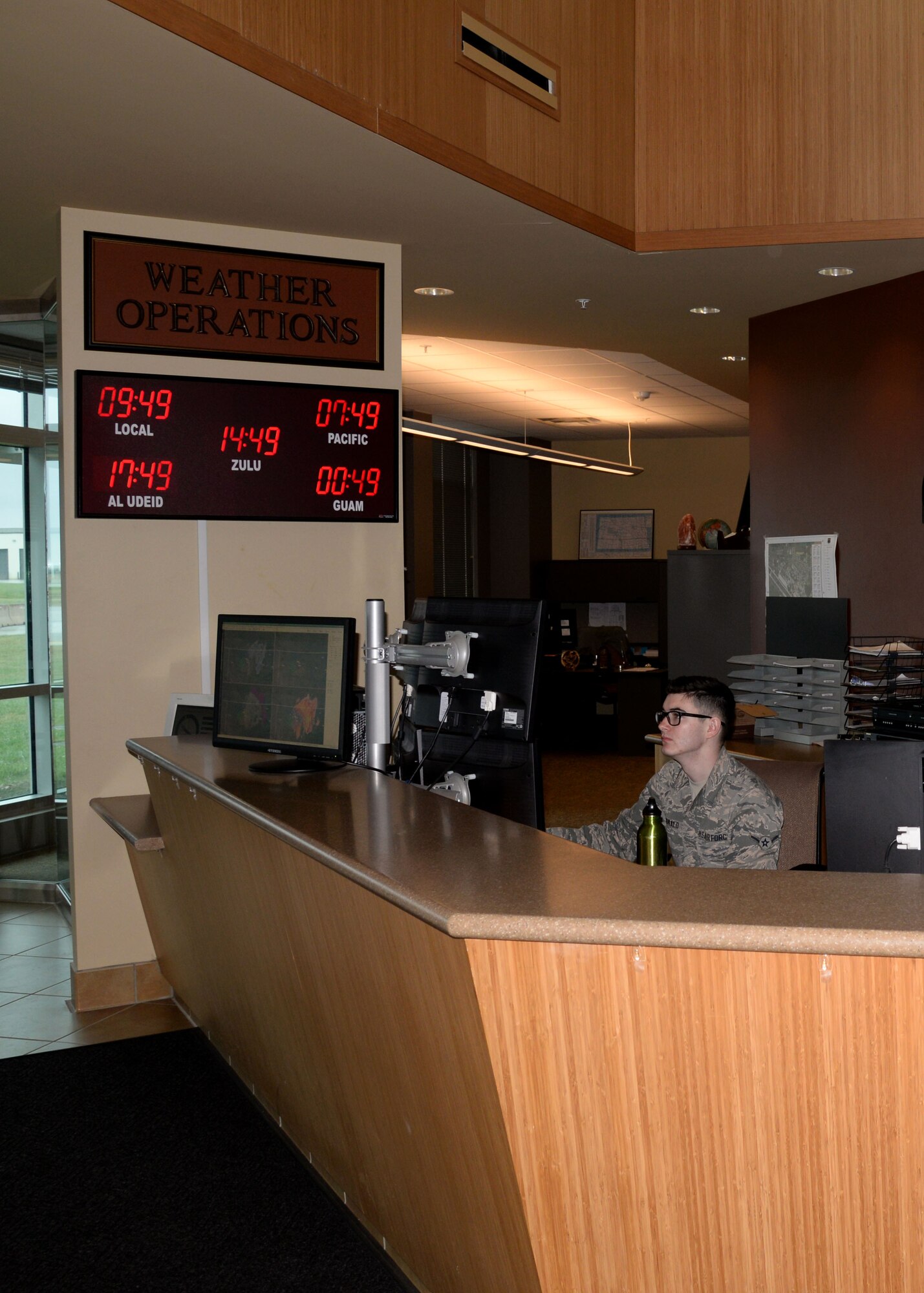 Airman Connor McDonald, 5th Operations Support Squadron weather forecaster, monitors weather conditions at Minot Air Force Base, N.D., April 18, 2017. Weather forecasters monitor satellite radar and forecast the projected weather. (U.S. Air Force photos/Airman 1st Class Dillon Audit)