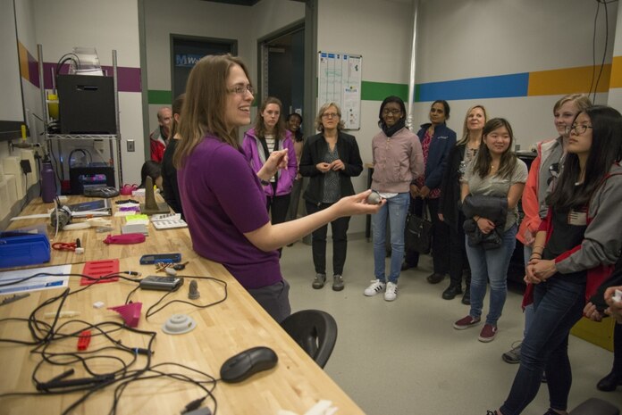 Caroline Scheck, a mechanical engineer with the Additive Manufacturing Project Office (Code 6103), tells middle- and high-school students with the Washington, D.C., Girls in Technology (GIT) program about the Manufacturing, Knowledge and Education (MAKE) Lab, Naval Surface Warfare Center, Carderock Division™s 3-D printing space for workforce development and science, technology, engineering and math (STEM) outreach in West Bethesda, Md., March 29. Carderock™s women engineers and other employees hosted the local GIT chapter to tell and show them about career opportunities in STEM with Carderock and the Department of the Navy. (U.S. Navy photo by Dustin Q. Diaz/Released)