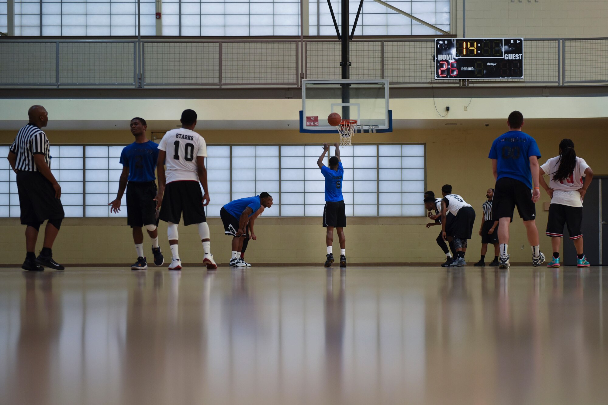 Jerry Cannon, 2nd Security Forces Squadron player, shoots from the free throw line during the first game of the Intramural Basketball Championship at Barksdale Air Force Base, La., April 18, 2017. Cannon scored 13 points in the first game, but that wasn’t enough to beat the 2nd Force Support Squadron basketball team. (Air Force photo/Airman 1st Class Stuart Bright)