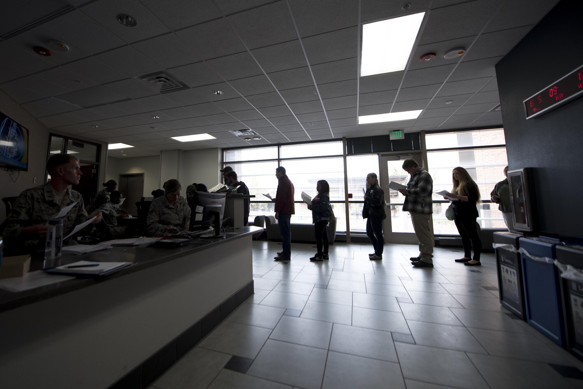 PETERSON AIR FORCE BASE, Colo. –Individual Ready Reserve Muster attendees gather in the lobby of the Summit Center to begin processing through required stations here at Peterson Air Force Base, Colo., April 22, 2017. The attendees processed through medical, Air National Guard and Air Force Reserve recruiting, Veteran's Assistance benefits, military identification and civilian employment information stations. (U.S. Air Force photo by Airman 1st Class Dennis Hoffman)