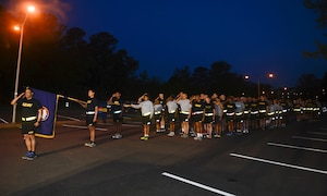 U.S. Army Training and Doctrine Command Soldiers salute during the National Anthem at the Army Reserves’ Birthday Celebration Run at Joint Base Langley-Eustis, Va., April 21, 2017. The Army Reserve was established on April 23, 1908 when Congress authorized the Army to form a Medical Reserve Corps. (U.S. Air Force photo/Airman 1st Class Kaylee Dubois)