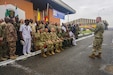 U.S. Army Sgt. Maj. Harold Estabrooks, U.S. Army Africa Army Reserve Engagement Cell, directs the arrangement of the group photo following the opening ceremony for exercise Unified Focus 2017, held on the Douala Naval Base, April 24, 2017. UF 17 is a weeklong tabletop exercise that brings the military partners of the Lake Chad basin area’s Multinational Joint Task Force (MNJTF) together to practice joint planning and coordination through a series of scripted vignettes.