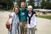 Veterans and spouses pose for a photo during a tour of the George W. Bush Airpark during their reunion, April 24 to 26, at Moody Air Force Base, Ga. The veterans were all stationed at Moody in the late 1970s. Many fought alongside one another during the Vietnam War in support of the F-4E Phantom II’s mission (U.S. Air Force Photo by Airman 1st Class Janiqua P. Robinson)