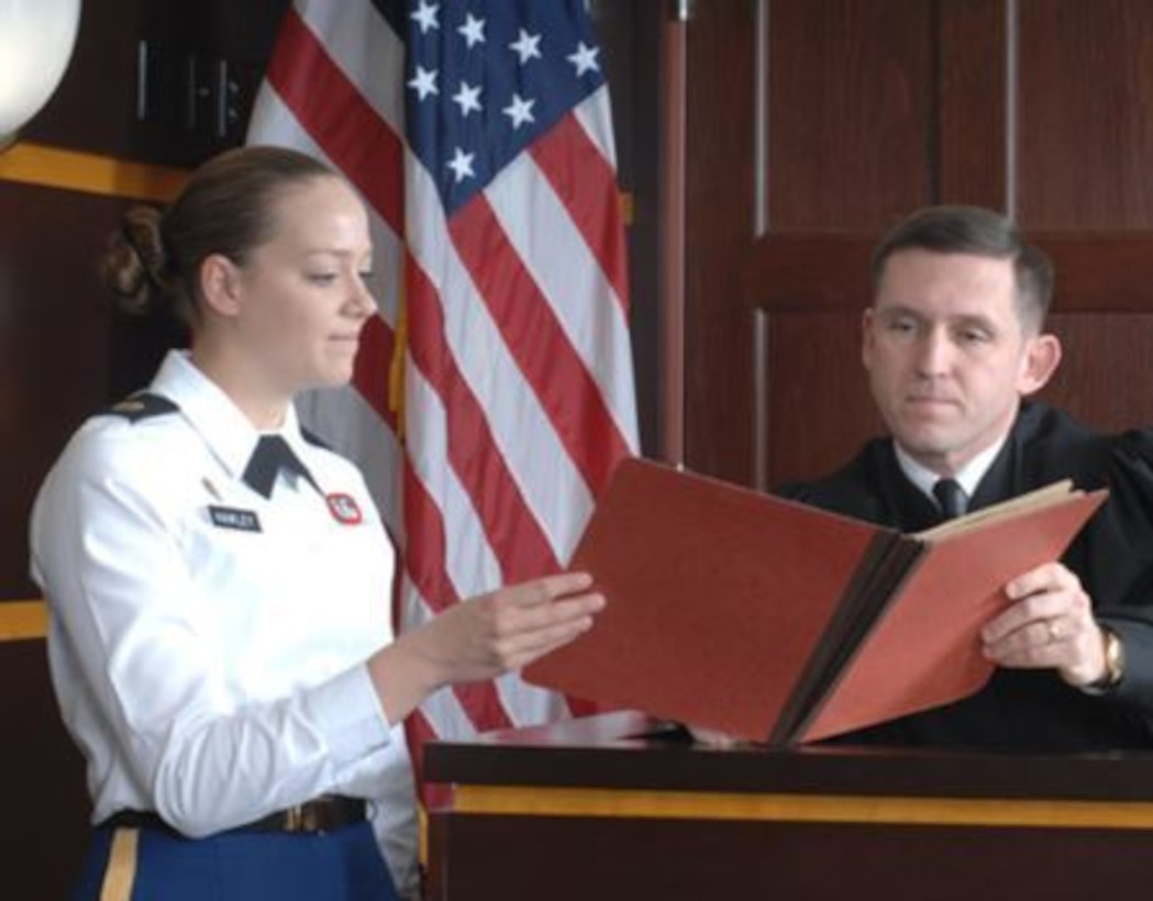 In 2012, Staff Sgt. Sarah Hawley, a paralegal noncommissioned officer with the U.S. Army Reserve Legal Command worked at the court at Fort Bragg, NC. She is pictured here with a military judge is Lt. Col. Bret Batdorff. (photo/contributed)