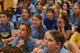 Kids from Legacy Elementary School watch a falconer and her bird during an Earth Day demonstration at Barksdale Air Force Base, La., April 21, 2017. Falconers are people who are approved by the U.S. Government to trap falcons and use them for hunting small game. (U.S. Air Force photo/Senior Airman Luke Hill)