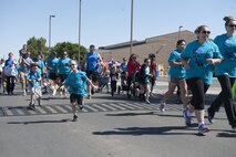 The Youth and Teen Center hosted Run for the Pieces, a fun run and walk that aimed to raise awareness for children that are on the autism spectrum on April 22, 2017 at Holloman Air Force Base, N.M. The run was followed by carnival-style events including face paintings, balloon animal crafting and a fun photo booth. (U.S. Air Force photo by Airman 1st Class Ilyana A. Escalona)