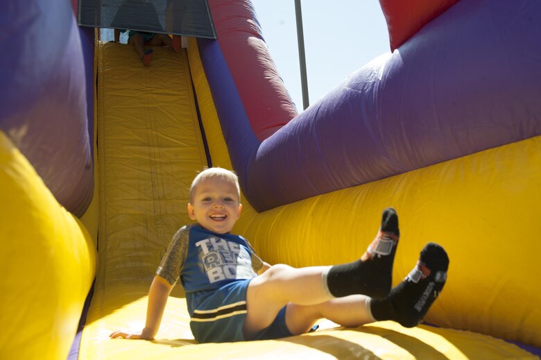 The Youth and Teen Center hosted the Military Children’s Carnival on April 22, 2017 at Holloman Air Force Base, N.M. The carnival included bounce houses, bike races, a dunk tank and a DJ providing live entertainment. Inside the center were balloon animal stations, glitter tattoo stations and a fun photo booth. (U.S. Air Force photo by Airman 1st Class Ilyana A. Escalona)