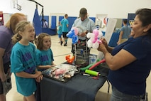 The Youth and Teen Center hosted the Military Children’s Carnival on April 22, 2017 at Holloman Air Force Base, N.M. The carnival included bounce houses, bike races, a dunk tank and a DJ providing live entertainment. Inside the center were balloon animal stations, glitter tattoo stations and a fun photo booth. (U.S. Air Force photo by Airman 1st Class Ilyana A. Escalona)