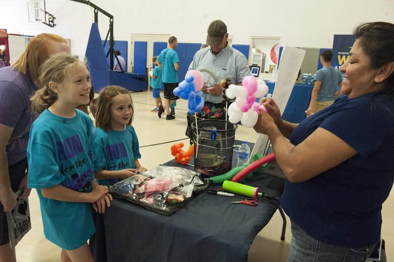 The Youth and Teen Center hosted the Military Children’s Carnival on April 22, 2017 at Holloman Air Force Base, N.M. The carnival included bounce houses, bike races, a dunk tank and a DJ providing live entertainment. Inside the center were balloon animal stations, glitter tattoo stations and a fun photo booth. (U.S. Air Force photo by Airman 1st Class Ilyana A. Escalona)