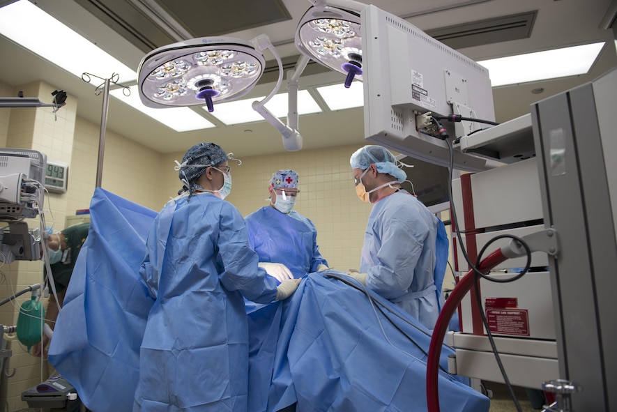 Members of the 366th Medical Group perform surgery April 12, 2017, at Mountain Home Air Force Base, Idaho, before the Military Treatment Facility transition. The MTF will become an outpatient clinic by mid-summer, 2017. (U.S. Air Force photo by Airman First Class Jeremy D. Wolff/Released)