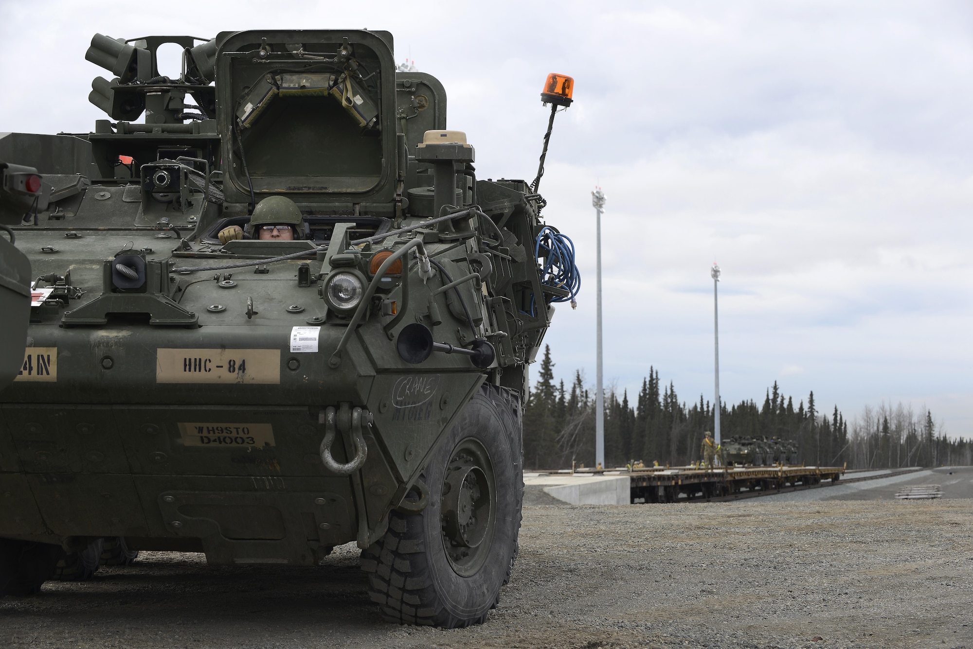 Soldiers assigned to the 1st Stryker Brigade Combat Team, 25th Infantry Division “Arctic Wolves,” unload M1126 Stryker Infantry Carrier Vehicles from a railhead on Joint Base Elmendorf-Richardson, April 25, 2017. The Arctic Wolves came to JBER from Fort Wainwright to participate in a training exercise displaying the 1-25 SBCTs deployment capabilities. 