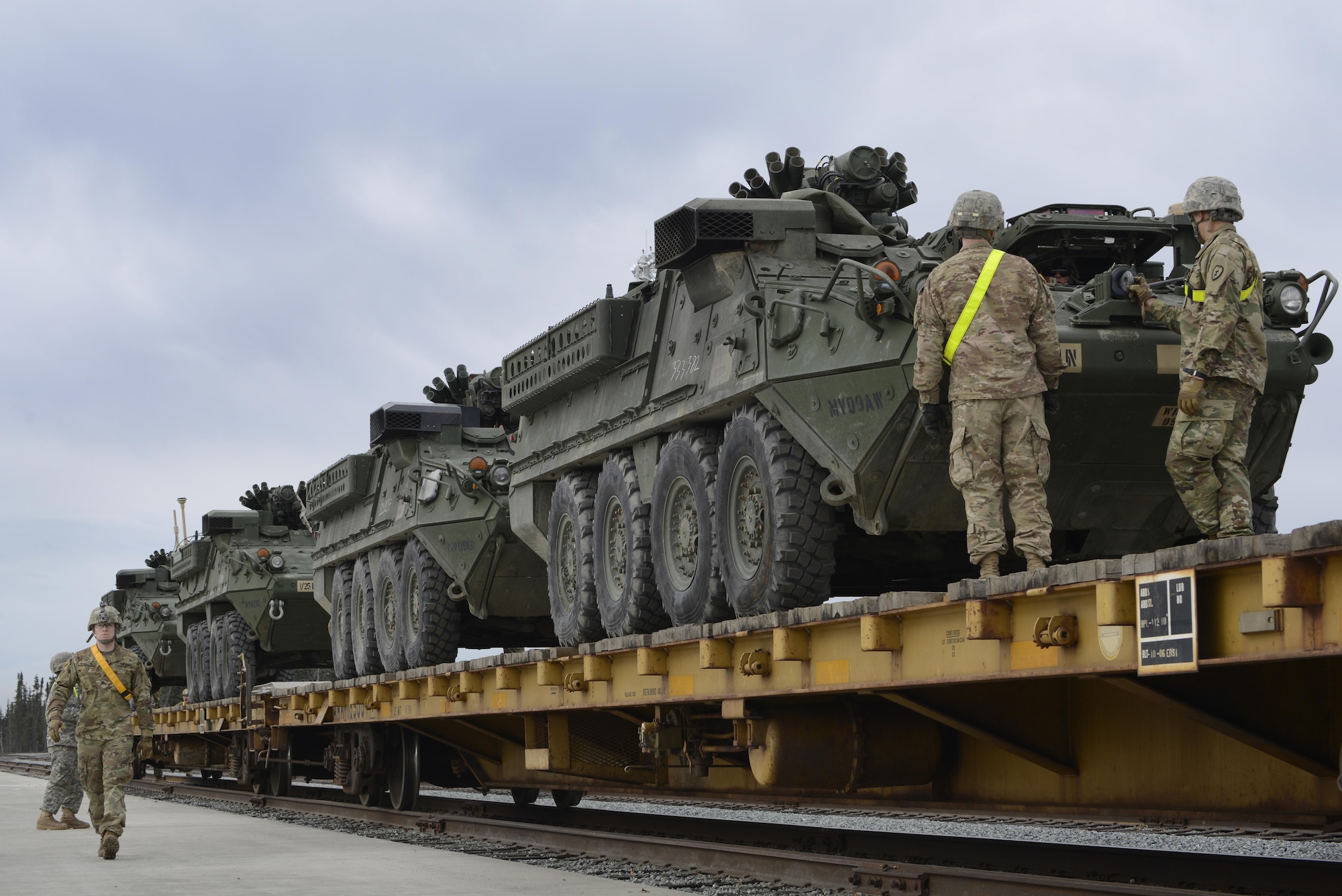 Soldiers assigned to the 1st Stryker Brigade Combat Team, 25th Infantry Division “Arctic Wolves,” unload M1126 Stryker Infantry Carrier Vehicles from a railhead on Joint Base Elmendorf-Richardson, April 25, 2017. The Arctic Wolves came to JBER from Fort Wainwright to participate in a training exercise displaying the 1-25 SBCTs deployment capabilities. 