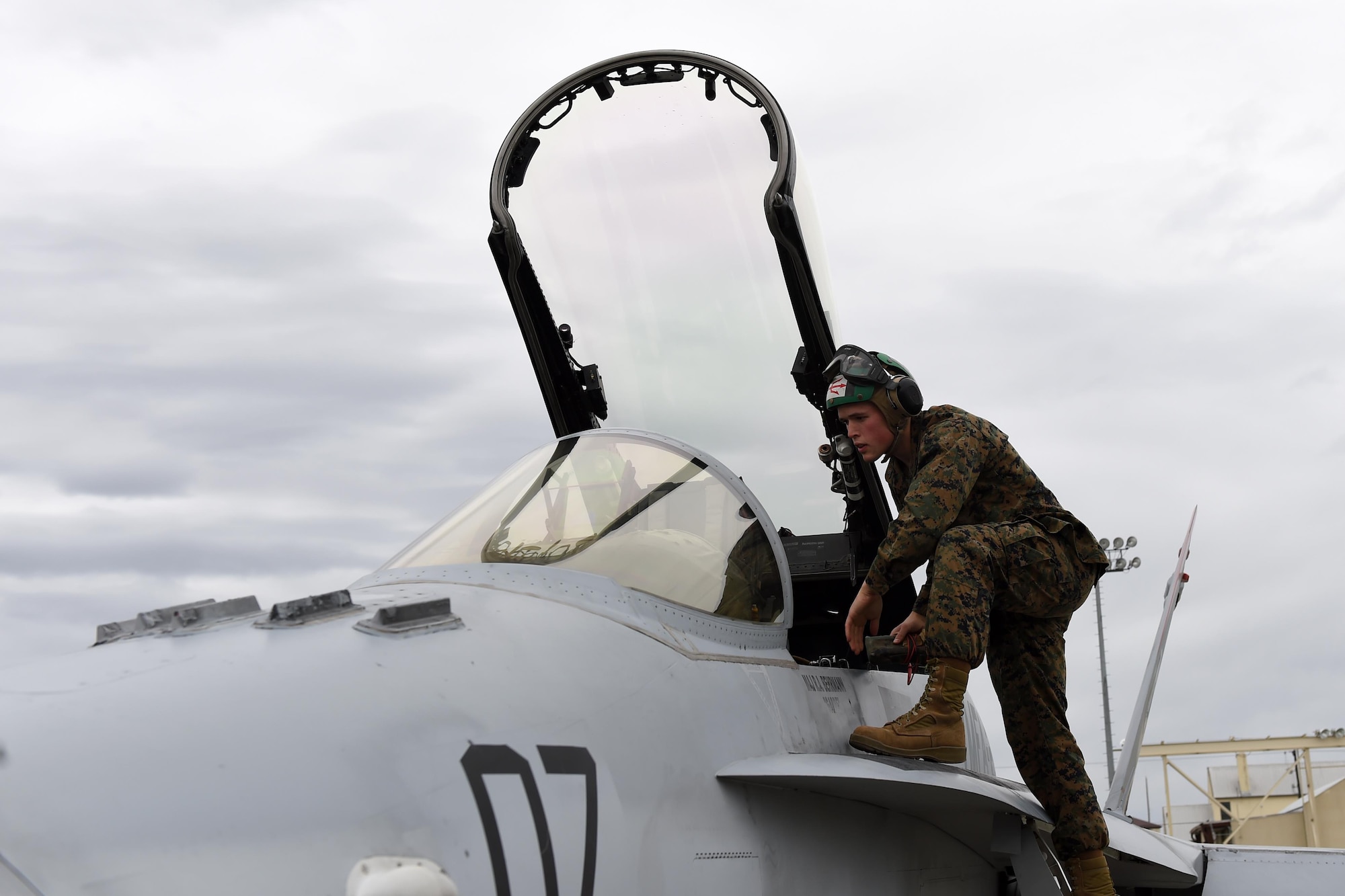 U.S. Marine Corps Sgt. Dominic Schulte, Marine Fighter Attack Squadron 232 flight equipment technician from Miramar, Calif., inspects an FA-18C Hornet from his squadron at the flight line at Joint Base Elmendorf-Richardson, Alaska, for Exercise Northern Edge, April 24, 2017. Various military aircraft from all services will practice operations, techniques and procedures while enhancing interoperability during Northern Edge 2017 – Alaska’s premier joint-training exercise. 
