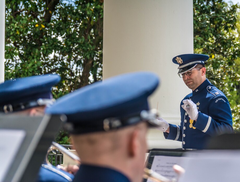 Captain Boothe conducts the Ceremonial Brass at the 2017 Spring White House Garden  Tour. (U.S. Air Force photos/MSgt Brandon Chaney/released)