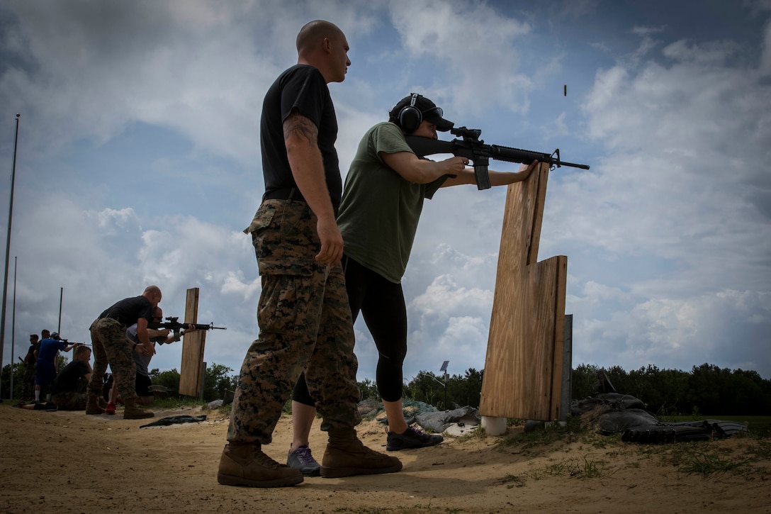 High school and college educators engage targets at the unknown distance range during the live-fire portion of the Educators’ Workshop on Marine Corps Recruit Depot Parris Island, S.C., April 20, 2017. The workshop is a four-day program designed to better inform high school and college educators from Maine, New Hampshire, Vermont and Massachusetts about the benefits and opportunities available during service in the Marine Corps. This allows the attendees to return to their place of business and provide firsthand experience and knowledge with individuals interested in military service. (Official Marine Corps photo by Staff Sgt. Jonathan G. Wright / Released)