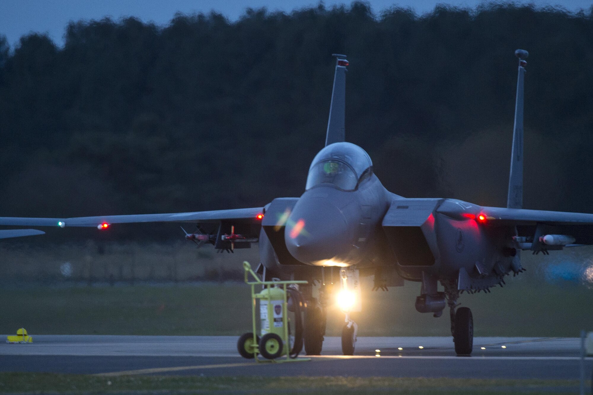 An F-15E Strike Eagle stands by to take-off for a training sortie at Royal Air Force Lakenheath, England, April 19. Strike Eagles have been assigned to RAF Lakenheath for 25 years. (U.S. Air Force photo/Staff Sgt. Emerson Nuñez)
