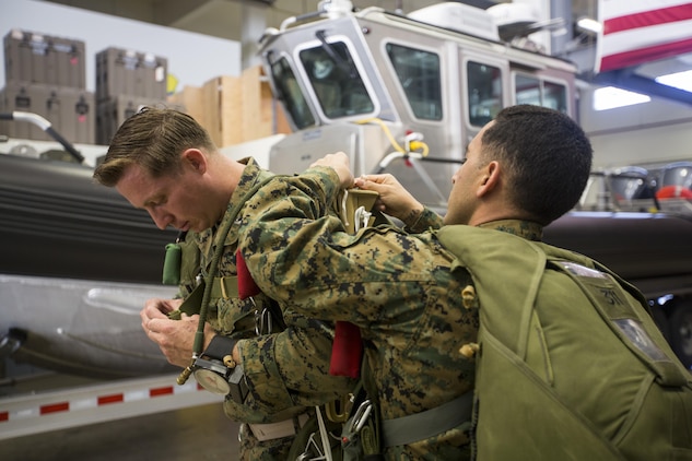 U.S. Special Operations Forces personnel take part in a military freefall jumpmaster course on Kadena Air Base, Okinawa, Japan, April 19, 2017. This marked the first time in history that the course was delivered outside of the continental United States. Hosted by the U.S. Marines Corps 3rd Reconnaissance Battalion and administered by a Mobile Training Team, the course qualified 27 Marines, Soldiers and Airmen as military freefall jumpmasters in Okinawa. (U.S. Marine Corps photo by Lance Cpl. Jordan A. Talley/Released)