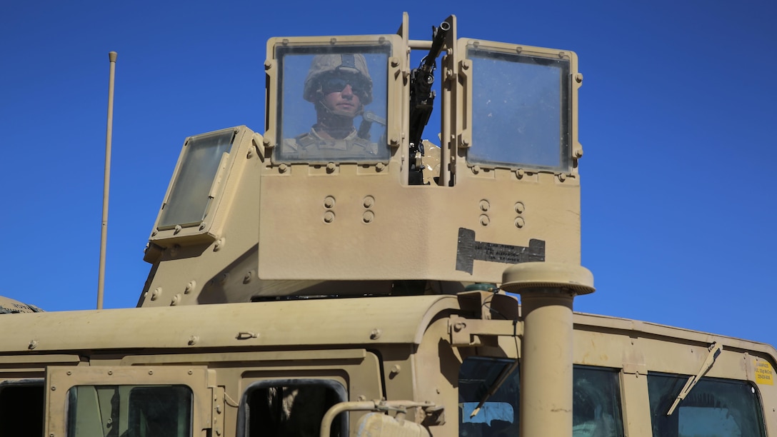 A Marine with Marine Aviation Weapons and Tactics Squadron 1 provides security in a Humvee during the Assault Support Tactics 3 supporting the semiannual Weapons and Tactics Instructor Course 2-17 at Marine Corps Air Station Yuma, Arizona, April 21. Lasting seven weeks, WTI is a training evolution hosted by MAWTS-1 which provides standardized advanced and tactical training and certification of unit instructor qualifications to support Marine aviation training and readiness. The AST-3 training focused on conducting noncombatant evacuation operations in an urban environment while providing foreign humanitarian assistance to the simulated host nation. 
