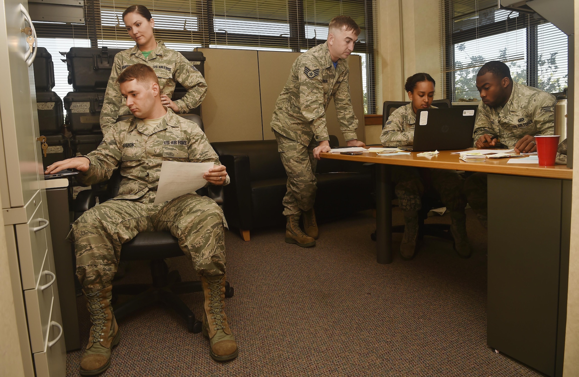 Airmen assigned to the 628th Contracting Squadron and 628th Comptroller Squadron train side-by-side during a contingency contracting exercise at Joint Base Charleston, S.C., April 21, 2017. The 628th CONS and 628th CPTS integrated to increase readiness during the exercise and tested the skillsets and knowledge of junior contracting and finance Airmen helping prepare them for a deployed environment. 