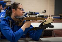 Eleanor Carlin, a Warrior CARE athlete, takes aim downrange at a shooting session of the adaptive sports camp at Eglin Air Force Base, Fla., April 25. The base hosts the week-long Wound Warrior CARE event that helps recovering wounded, ill and injured military members through specific hand-on rehabilitative training. (U.S. Air Force photo/Samuel King Jr.)